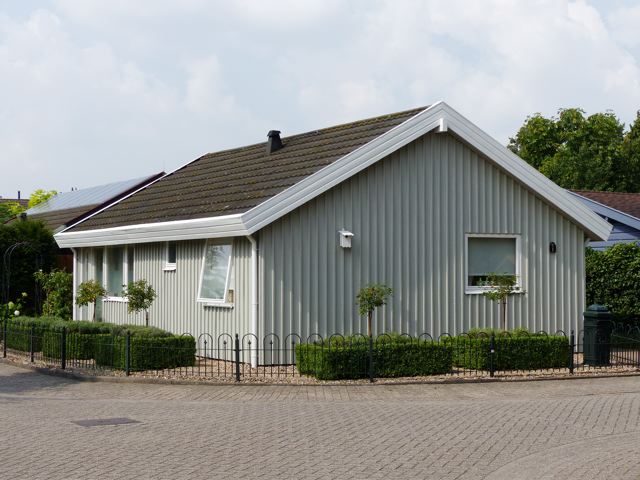 Peindre une maison en bois